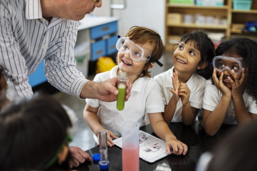 Young students learning in a science lesson