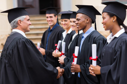 Graduates receiving diplomas