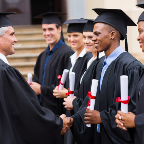 Graduates receiving diplomas