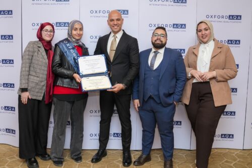 Student winner of OxfordAQA Go Further Award 2024 with their Teacher and family